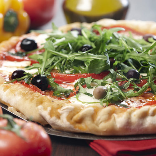 Mozzarella and salad rocket (arugula) pizza