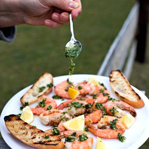 Easy grilled prawns with herb oil
